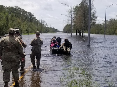 Members of the Louisiana National Guard rescue people from high water in south Louisiana caused by Hurricane Ida. As of Aug. 31, 2021, Guardsmen had rescued 359 people and 55 pets either by high-water vehicles, by boats or by air.