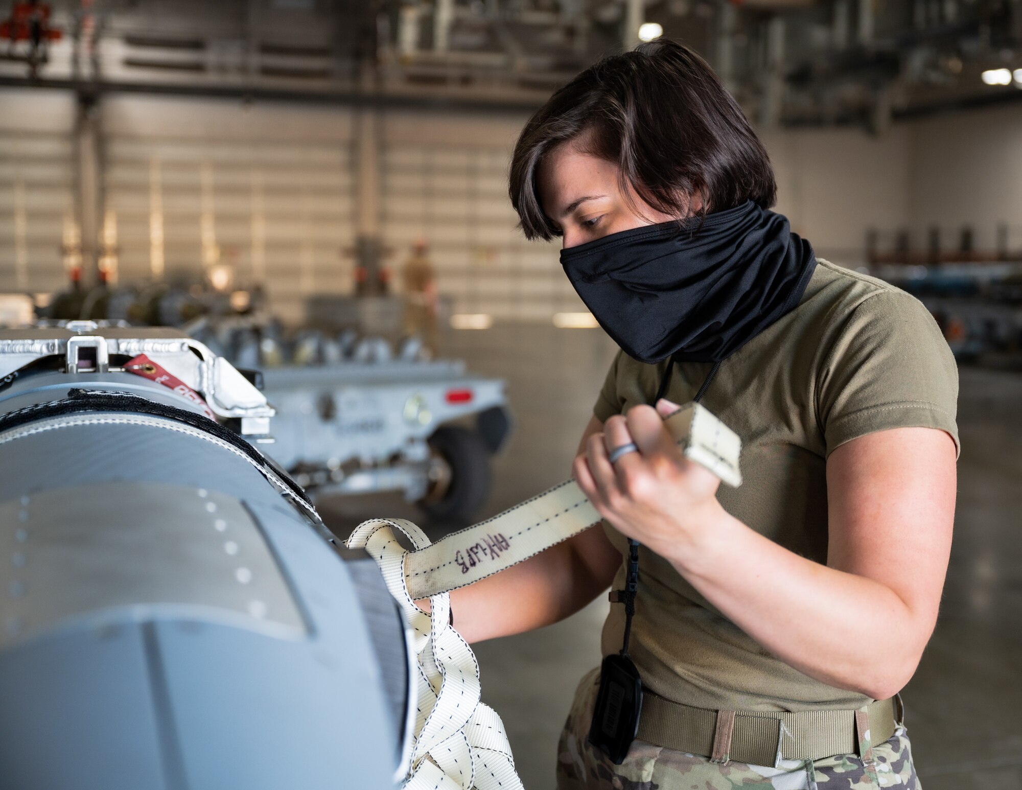 Airman 1st Class Stephanie Degennaro, 2nd Munitions Squadron conventional maintenance support technician, prepares ADM-160 Miniature Air-Launched Decoy missiles for transportation at Barksdale Air Force Base, Louisiana, Aug. 24, 2021.