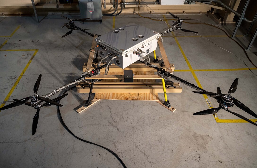 Aleksandr Yarovinskiy’s unmanned aircraft system sits in a work area outside the main chamber of the Benefield Anechoic Facility. Yarovinskiy has secured funding from SparkED, the 412th Test Wing’s innovation team, to design, build, test and deliver a drone that has the potential to expand and enhance the BAF’s data-capture capabilities. (Air Force photo by Harley Huntington)