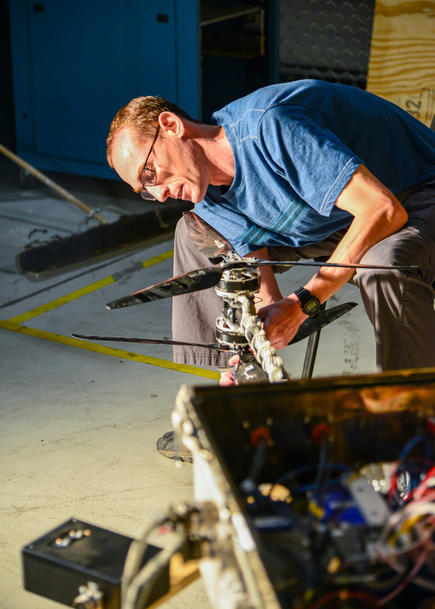 Aleksandr Yarovinskiy works on the body of his unmanned aircraft system in a work area just outside the main chamber of the Benefield Anechoic Facility. Yarovinskiy has secured funding from SparkED, the 412th Test Wing’s innovation team, to design, build, test and deliver a drone that has the potential to expand and enhance the BAF’s data-capture capabilities. (Air Force photo by Gary Hatch)