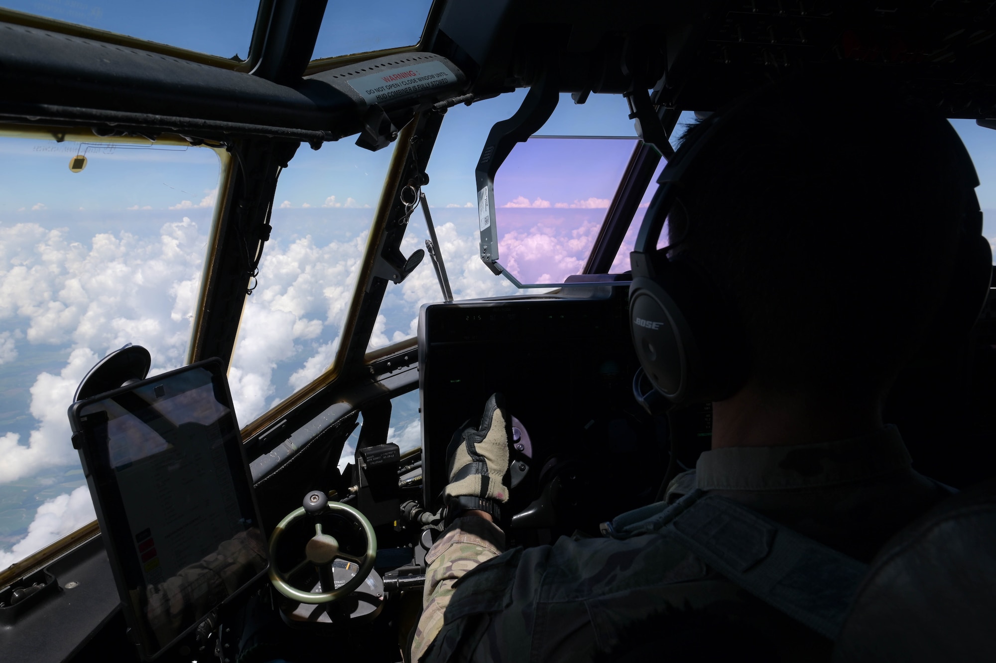 U.S. Air Force Lt. Col. Phillip Varilek, 71st Rescue Squadron HC-130J Combat King II pilot, flies out of Moody Air Force Base, Georgia, Aug. 24, 2021. The 71st RQS conducted an air-to-air refuel with a KC-46A Pegasus assigned to the 916th Air Refueling Wing, Seymour Johnson Air Force Base, North Carolina, as the first operational unit to be refueled by the KC-46A Pegasus. (U.S. Air Force photo by Senior Airman Rebeckah Medeiros)