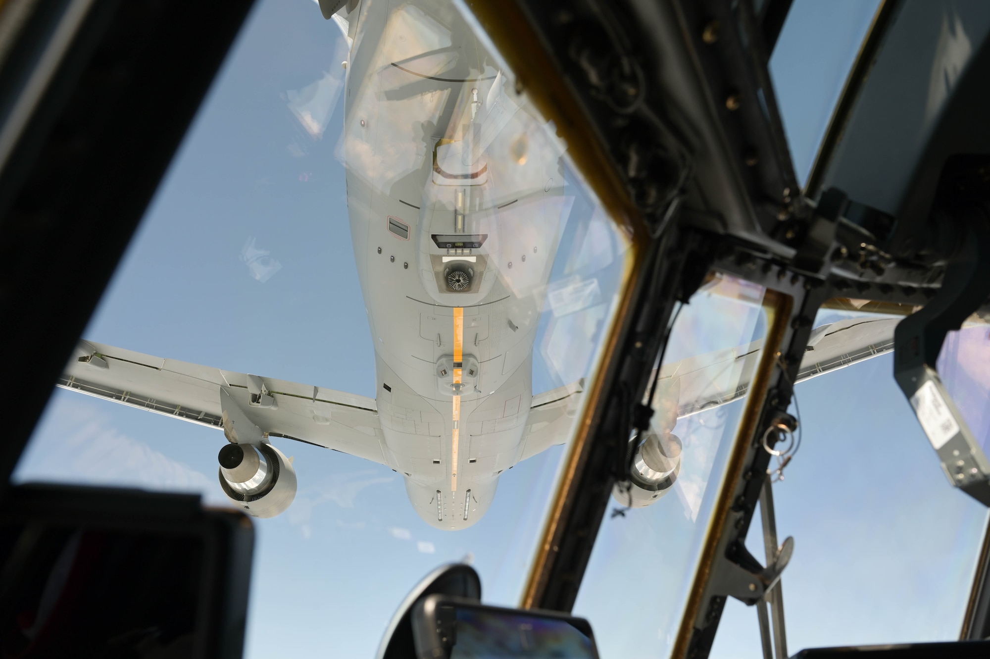 U.S. Air Force KC-46A Pegasus pilots assigned to the 916th Air Refueling Wing, Seymour Johnson Air Force Base, North Carolina, provide fuel for an HC-130J Combat King II aircraft assigned to the 71st Rescue Squadron, Moody Air Force Base, Georgia, during a flight near Moody AFB, Aug. 24, 2021. Air-to-air refueling allows aircraft to travel greater distances without needing to land, which enables Airmen to accomplish prolonged operations. The 71st RQS is the first operational unit to be refueled by the KC-46A Pegasus. (U.S. Air Force photo by Senior Airman Rebeckah Medeiros)