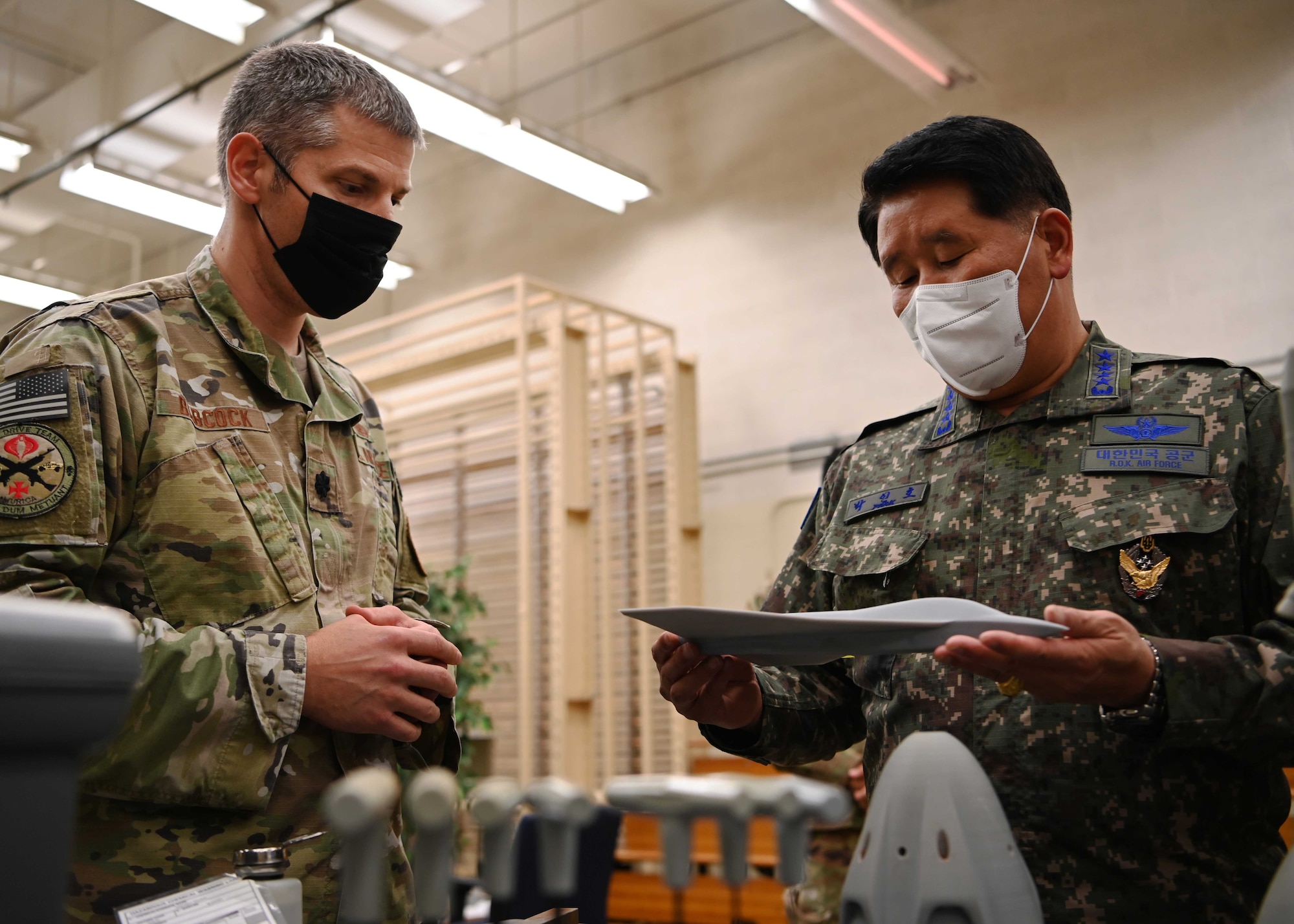 Lt. Col. Judson Babcock, Director, Aeronautics Laboratory, U.S. Air Force Academy, Colo., briefs Republic of Korea Air Force Gen. Inho Park, ROKAF Chief of Staff, during a tour at the Academy