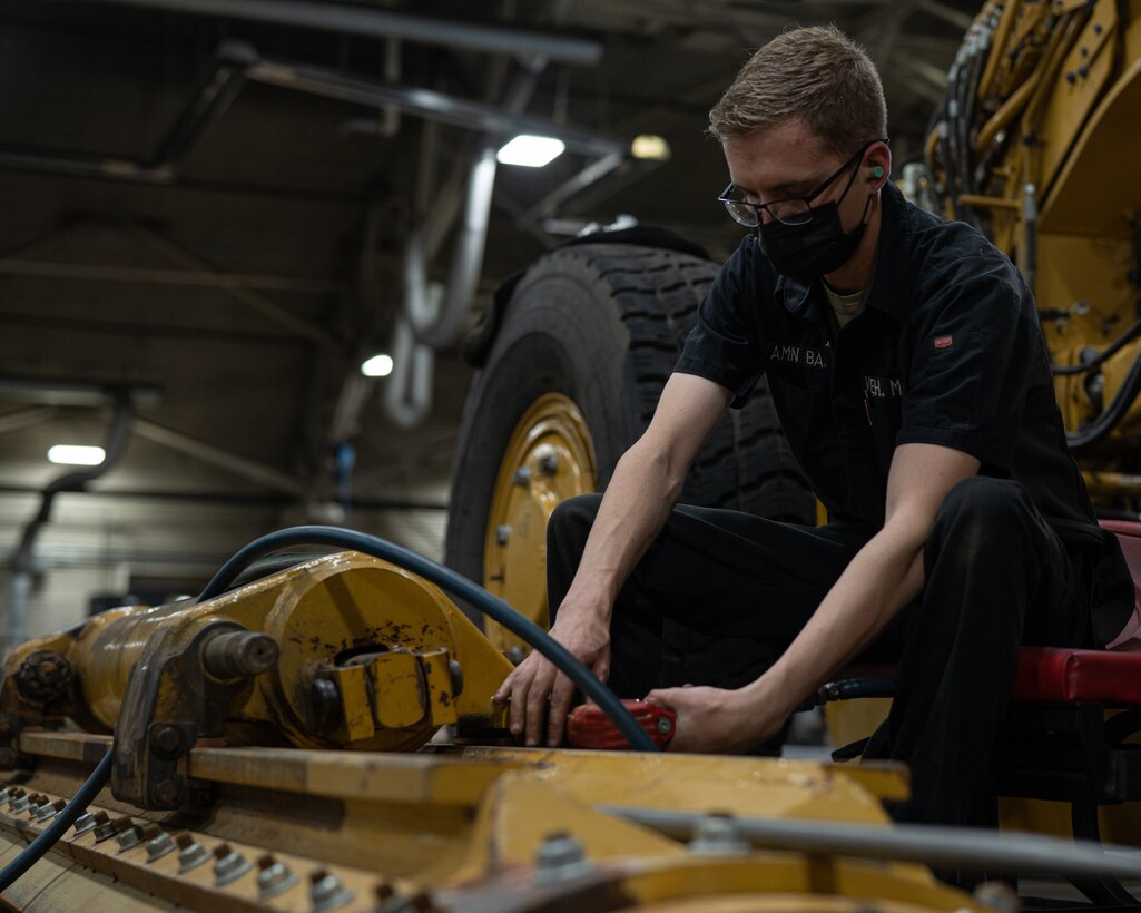 Man fixes machine