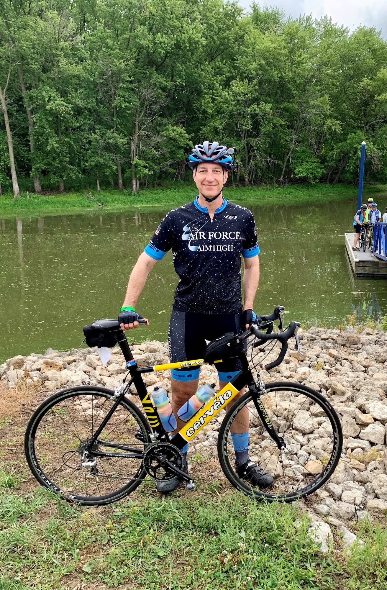 Brig. Gen. Jason Lindsey, Program Executive Officer for Presidential and Executive Airlift, during RAGBRAI, an annual, week-long bicycle ride across the State of Iowa.  RAGBRAI tradition is that you begin the ride by dipping your rear tire in the Missouri River or Big Sioux River - western border of Iowa - and end the ride by dipping your front tire in the Mississippi River on eastern border of Iowa. (Courtesy photo)