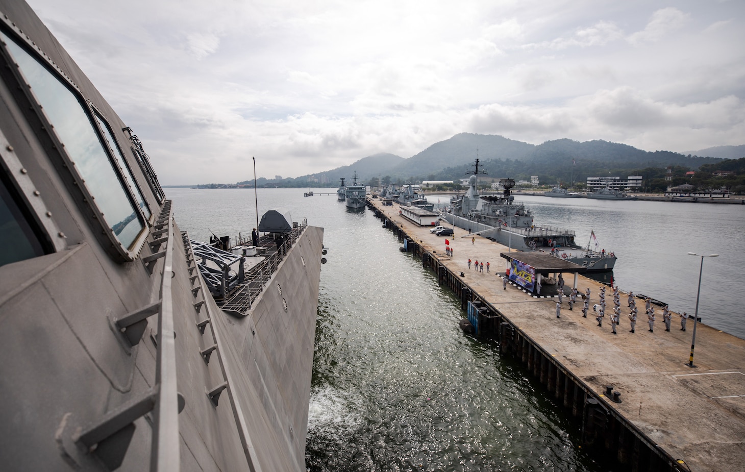 211129-N-LI768-1141 LUMUT, Malaysia (Nov. 29, 2021) - The Independence-variant littoral combat ship USS Tulsa (LCS 16) arrives at Lumut, Malaysia, following Maritime Training Activity (MTA) Malaysia 2021. MTA Malaysia 2021 is a continuation of 27 years of maritime engagements between the U.S. Navy and Royal Malaysian Navy serving to enhance mutual capabilities in ensuring maritime security and stability. Tulsa, part of Destroyer Squadron (DESRON) 7, is on a rotational deployment, operating in the U.S. 7th Fleet area of operations to enhance interoperability with partners and serve as a ready-response force in support of a free and open Indo-Pacific region. (U.S. Navy photo by Mass Communication Specialist 1st Class Devin M. Langer)
