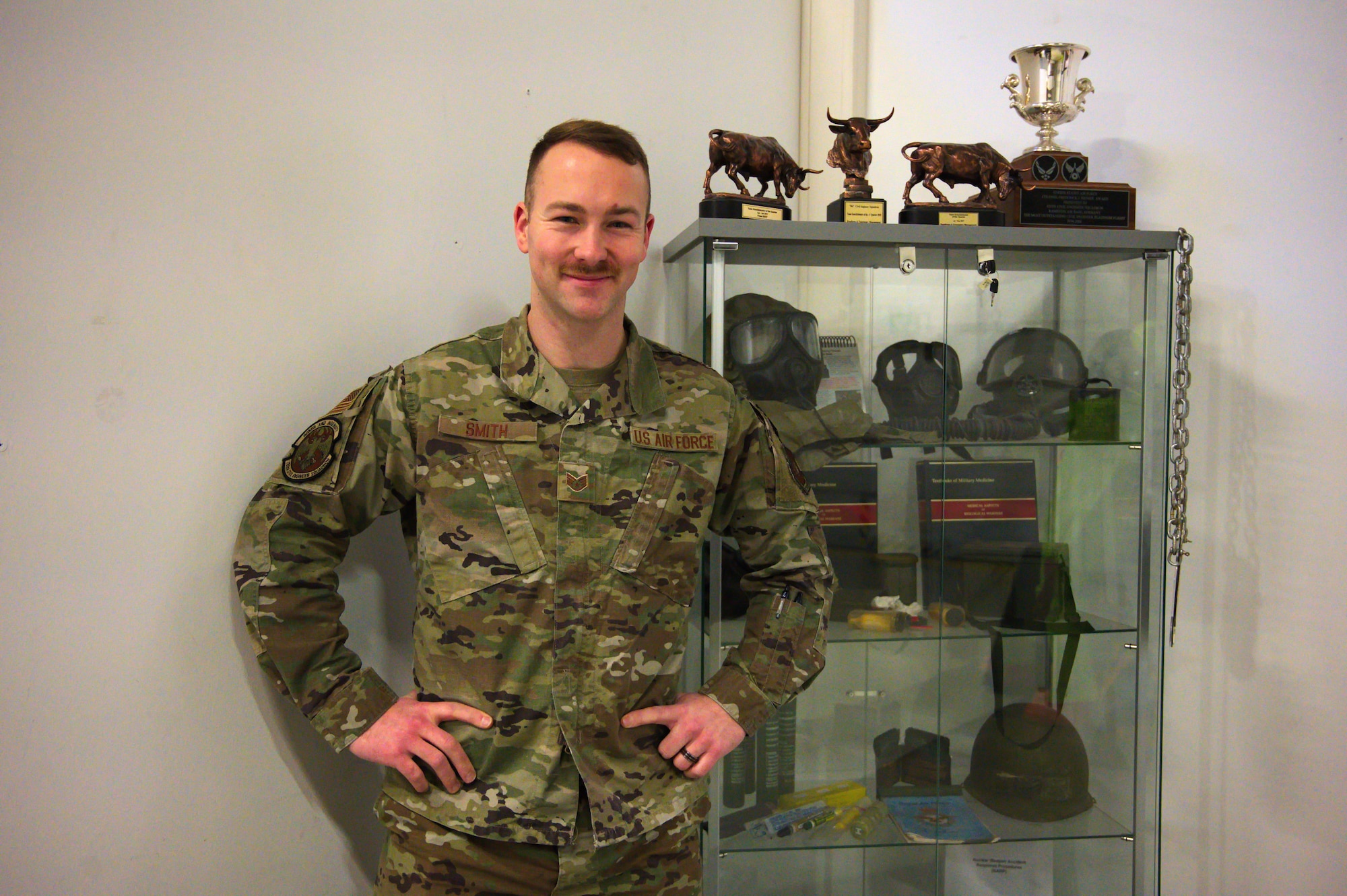 U.S. Air Force Staff Sgt. David Smith, 786th Civil Engineer Squadron emergency management craftsman, was awarded Airlifter of the Week at Ramstein Air Base, Germany, Nov. 15, 2021. As an emergency support function five, Smith, facilitates all the requested tasks that come into the Emergency Operations Center during Operations Allies Welcome.  (U.S. Air Force photo by Senior Airman Branden Rae)