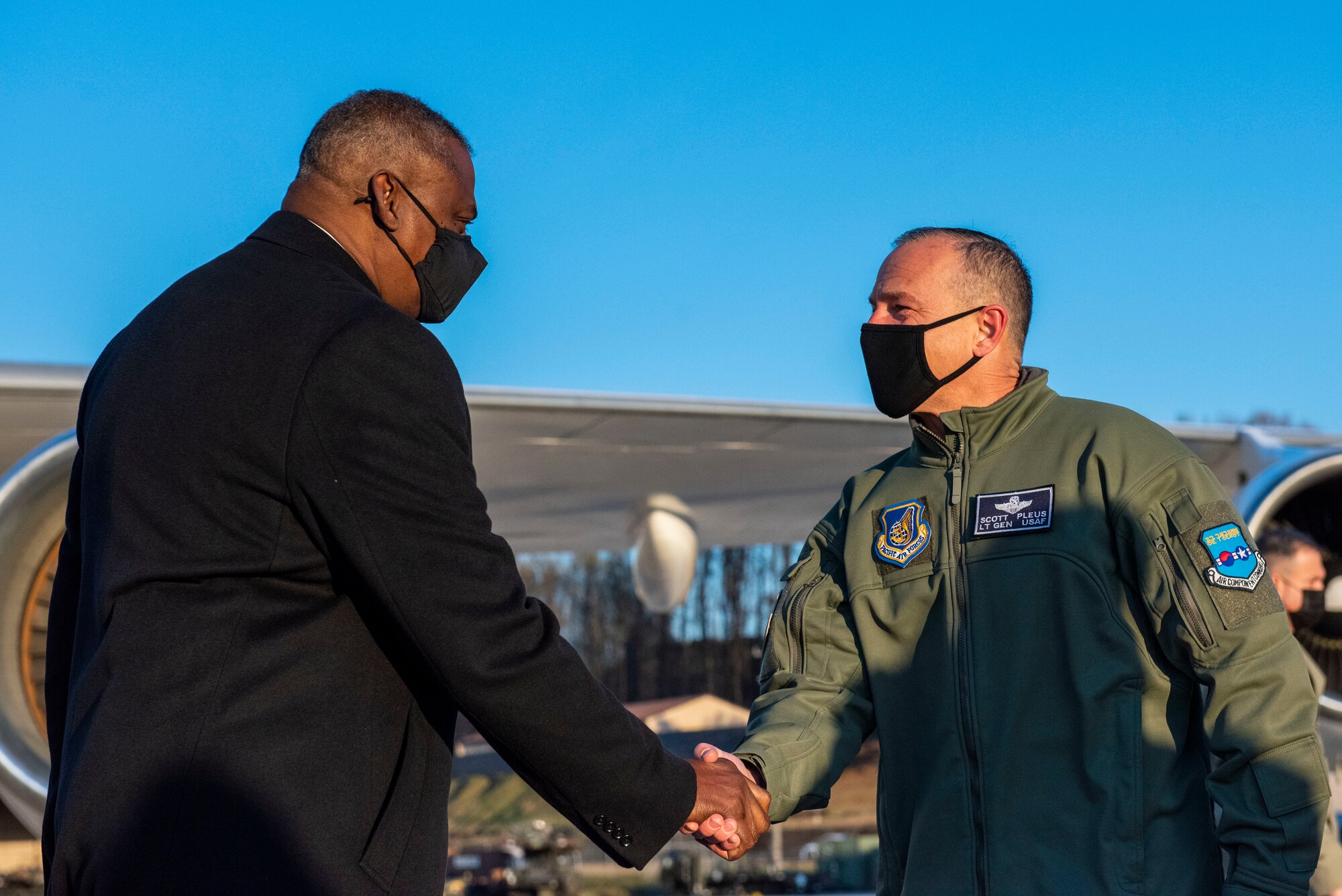 Lloyd J. Austin III, United States Secretary of Defense, is greeted by Lt. Gen. Scott Pleus, U.S. Forces Korea deputy commander, at Osan Air Base