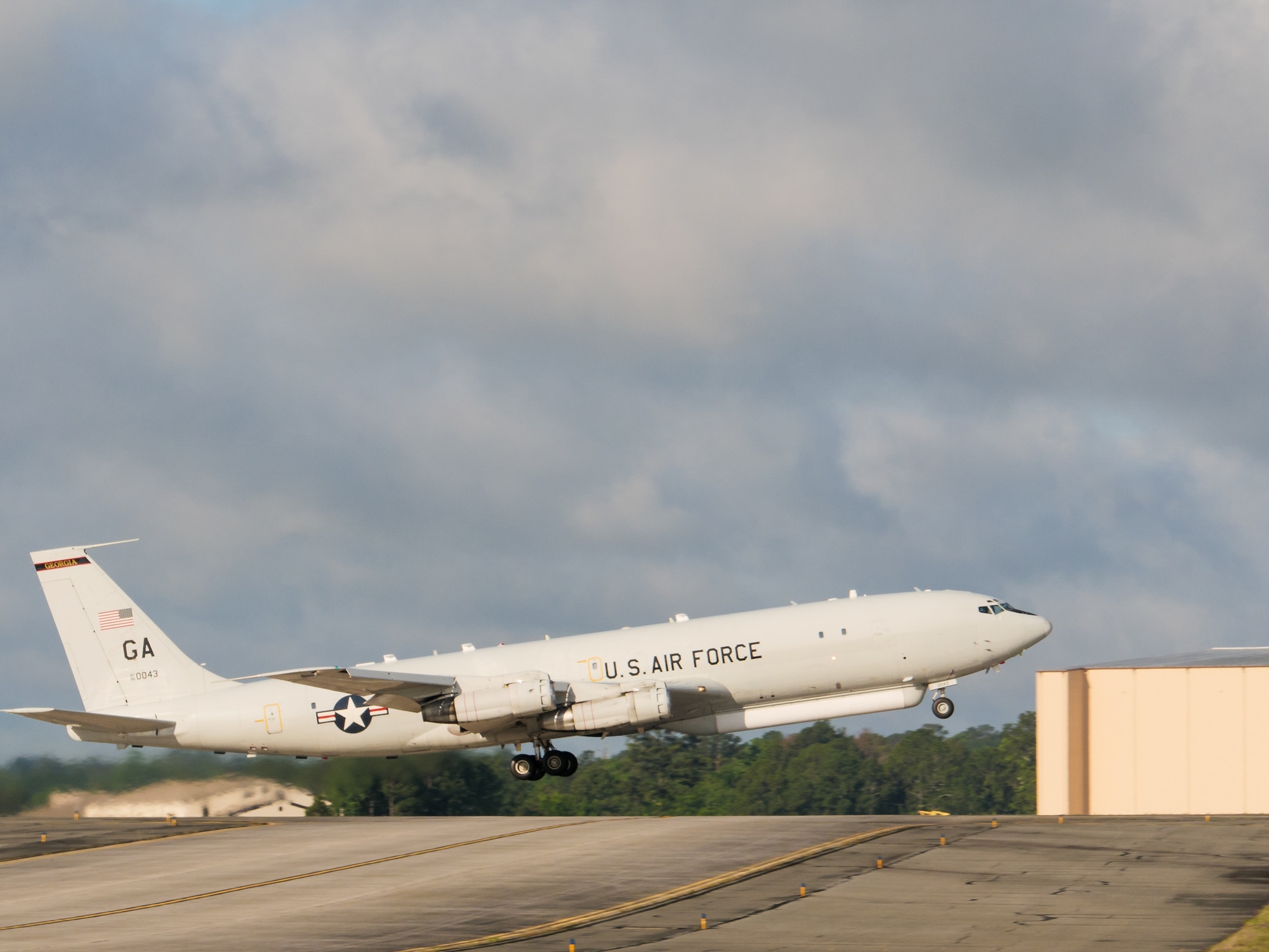 Photo shows aircraft taking off.