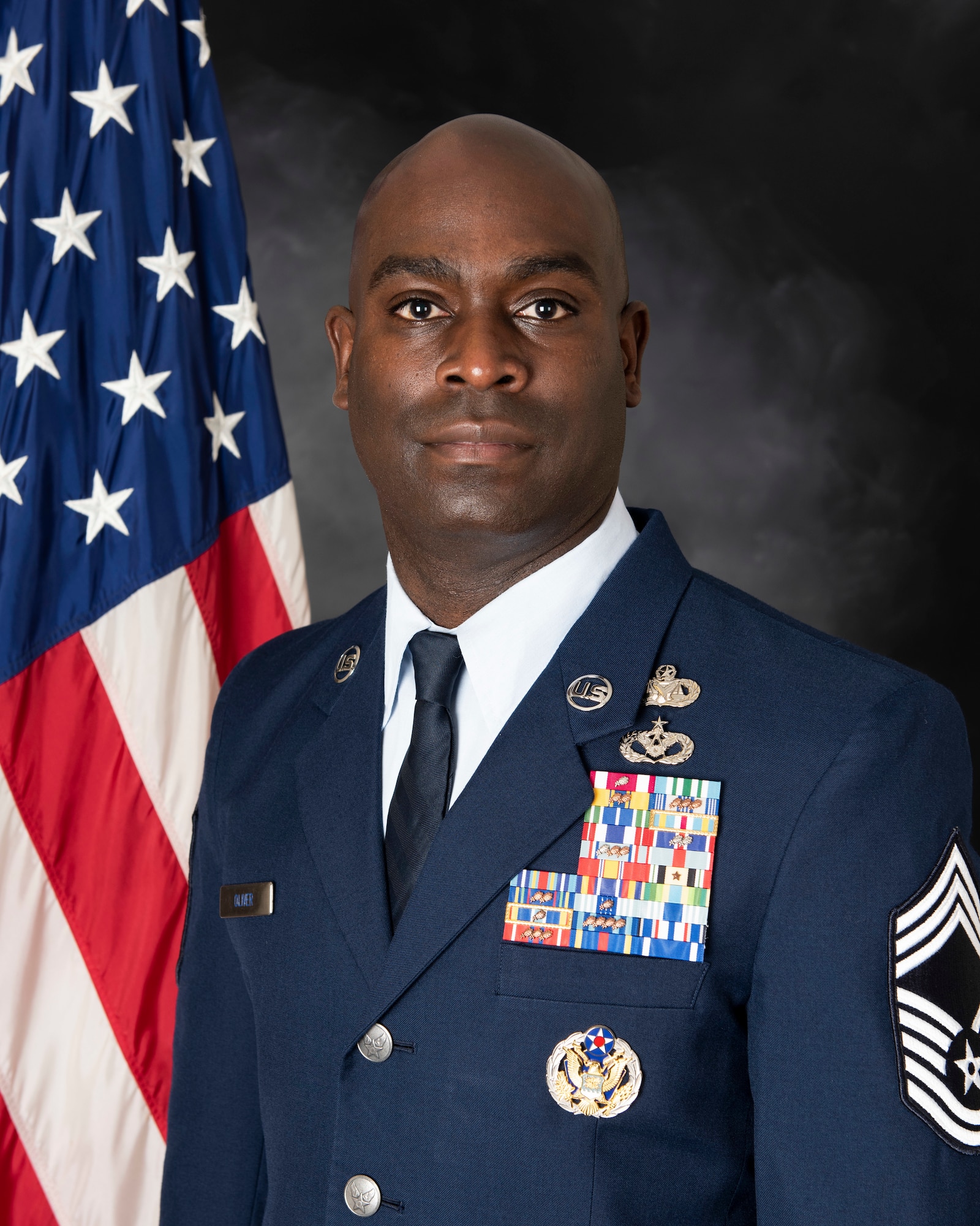 U.S. Air Force Chief Master Sgt. Ralph Oliver, 423rd Air Base Group senior enlisted leader, poses for an official photo Oct. 13, 2021, at Royal Air Force Alconbury, England. (U.S. Air Force photo by Senior Airman Jennifer Zima)