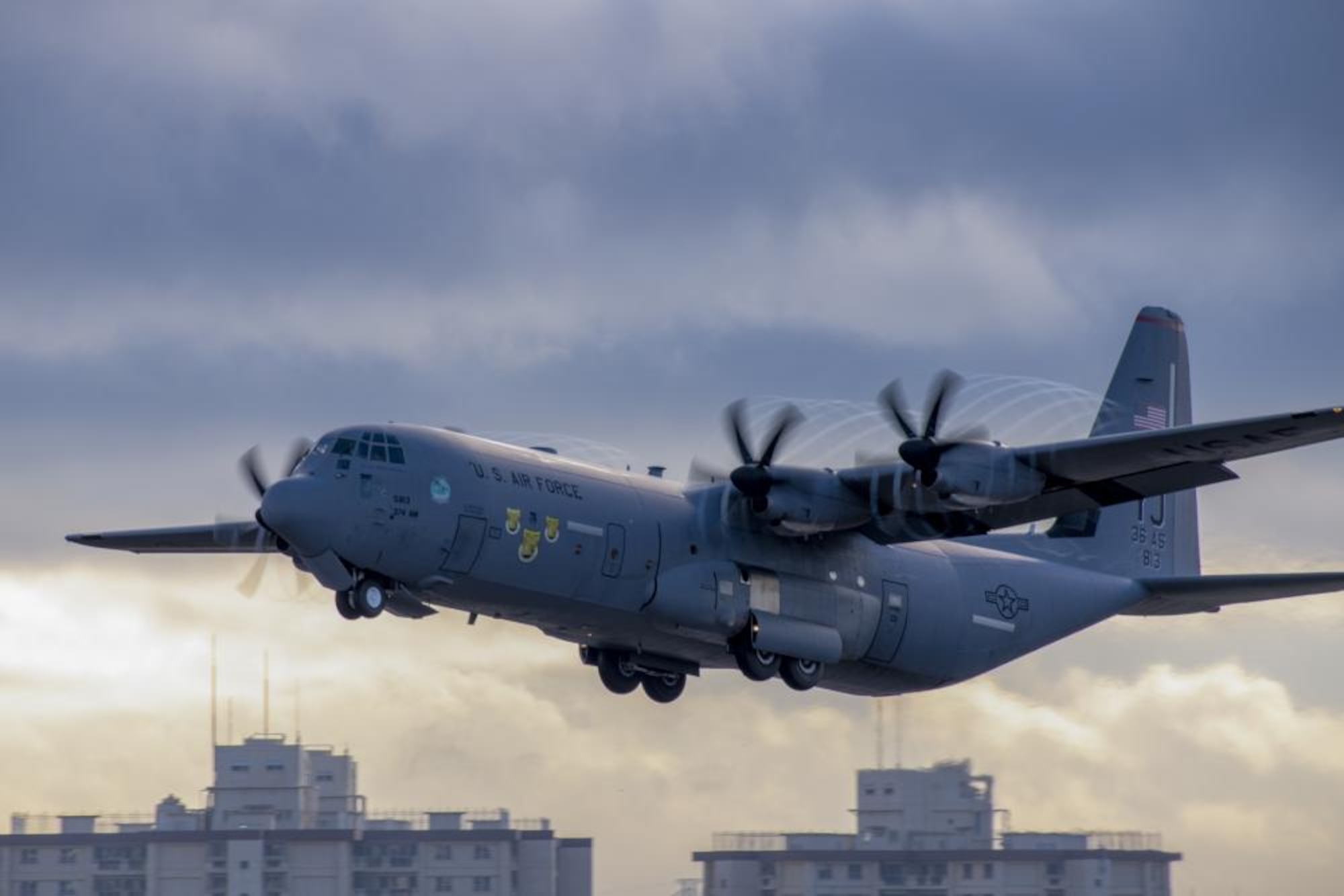 An Air Force C-130J Super Hercules assigned to the 36th Airlift Squadron takes off at Yokota Air Base, Japan, Dec. 1, 2021 in support of the 70th annual Operation Christmas Drop. Due to the geographical area covered by OCD, there are logistical challenges to High Availability/Disaster Recovery support. OCD allows our Airmen to rise to the challenge and find innovative solutions, demonstrating their constant readiness and willingness to solve problems no matter the circumstance. (U.S. Air Force photo by Yasuo Osakabe)