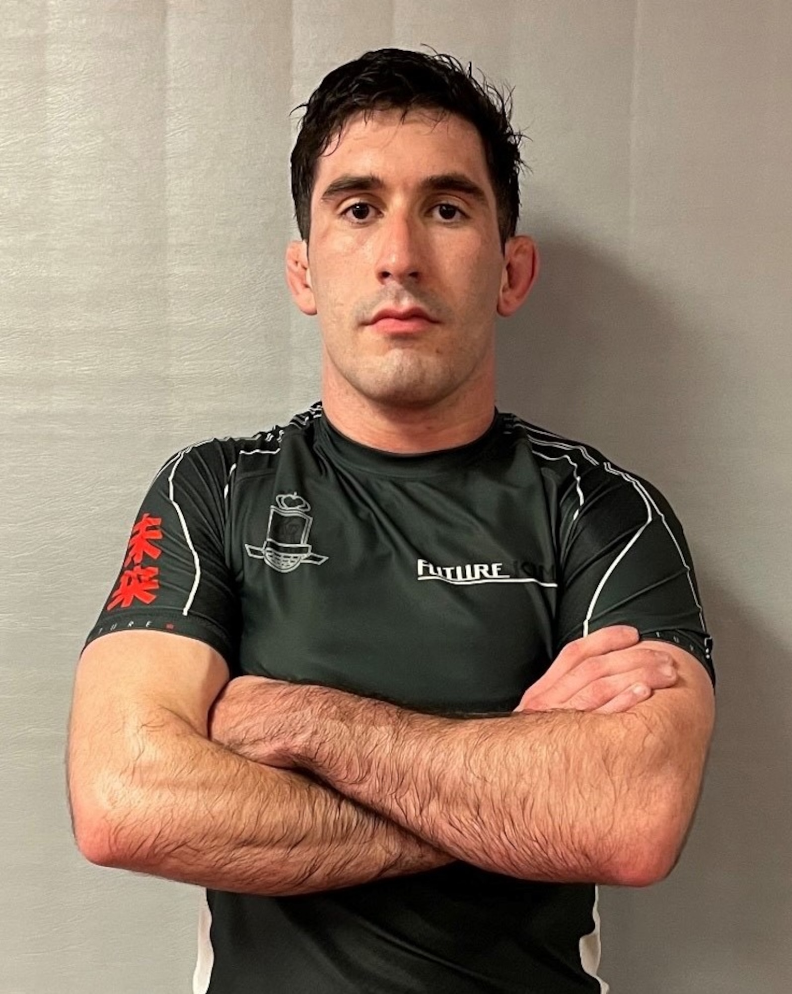 Senior Airman Griffin Broyles, 621st Contingency Response Squadron command support staff specialist, poses for a promotional photo Oct. 15, 2021, at a local gym in Feasterville, Pennsylvania. Broyles recently competed in his first professional grappling match in the 155-pound weight division. (Courtesy photo)