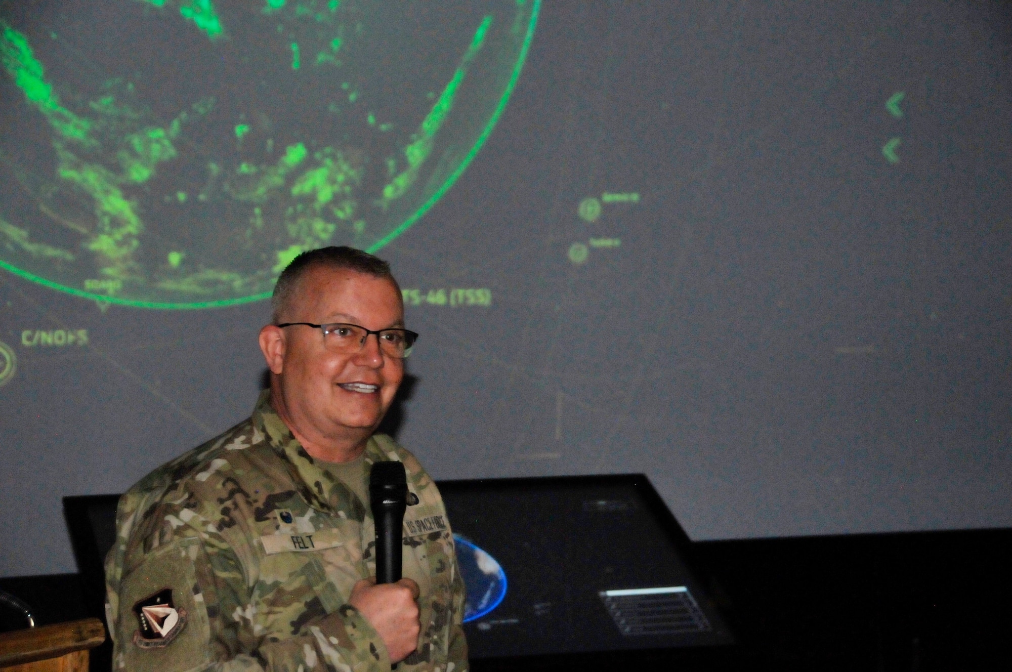 Col. Eric Felt, director of the Air Force Research Laboratory Space Vehicles Directorate, addresses colleagues and guests at the ribbon cutting ceremony of the directorate’s Legacy Portal Mission Control exhibit, held Nov. 15, 2021 at Kirtland AFB. (U.S. Air Force photo/Arturo Cardona)