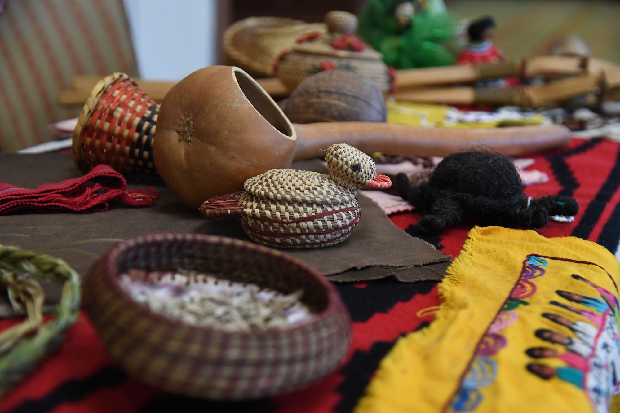 Native American artifacts and memorabilia are on display in recognition of National Native American Heritage Month inside the Bay Breeze Event Center at Keesler Air Force Base, Mississippi, Nov. 30, 2021. National Native American Heritage Month is celebrated throughout November by paying tribute to the ancestry and traditions of Native Americans. (U.S. Air Force Photo by Kemberly Groue)