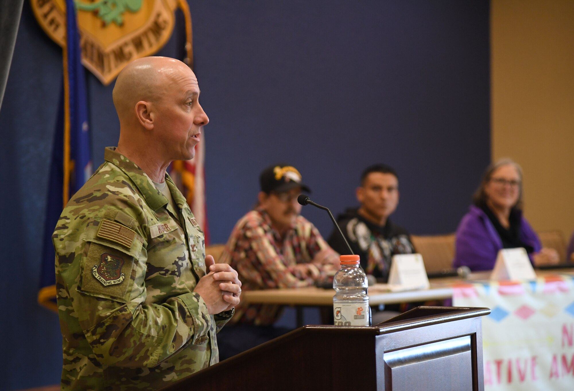 U.S. Air Force Col. William Hunter, 81st Training Wing commander, delivers welcoming remarks during a panel discussion held in recognition of National Native American Heritage Month inside the Bay Breeze Event Center at Keesler Air Force Base, Mississippi, Nov. 30, 2021. National Native American Heritage Month is celebrated throughout November by paying tribute to the ancestry and traditions of Native Americans. (U.S. Air Force Photo by Kemberly Groue)