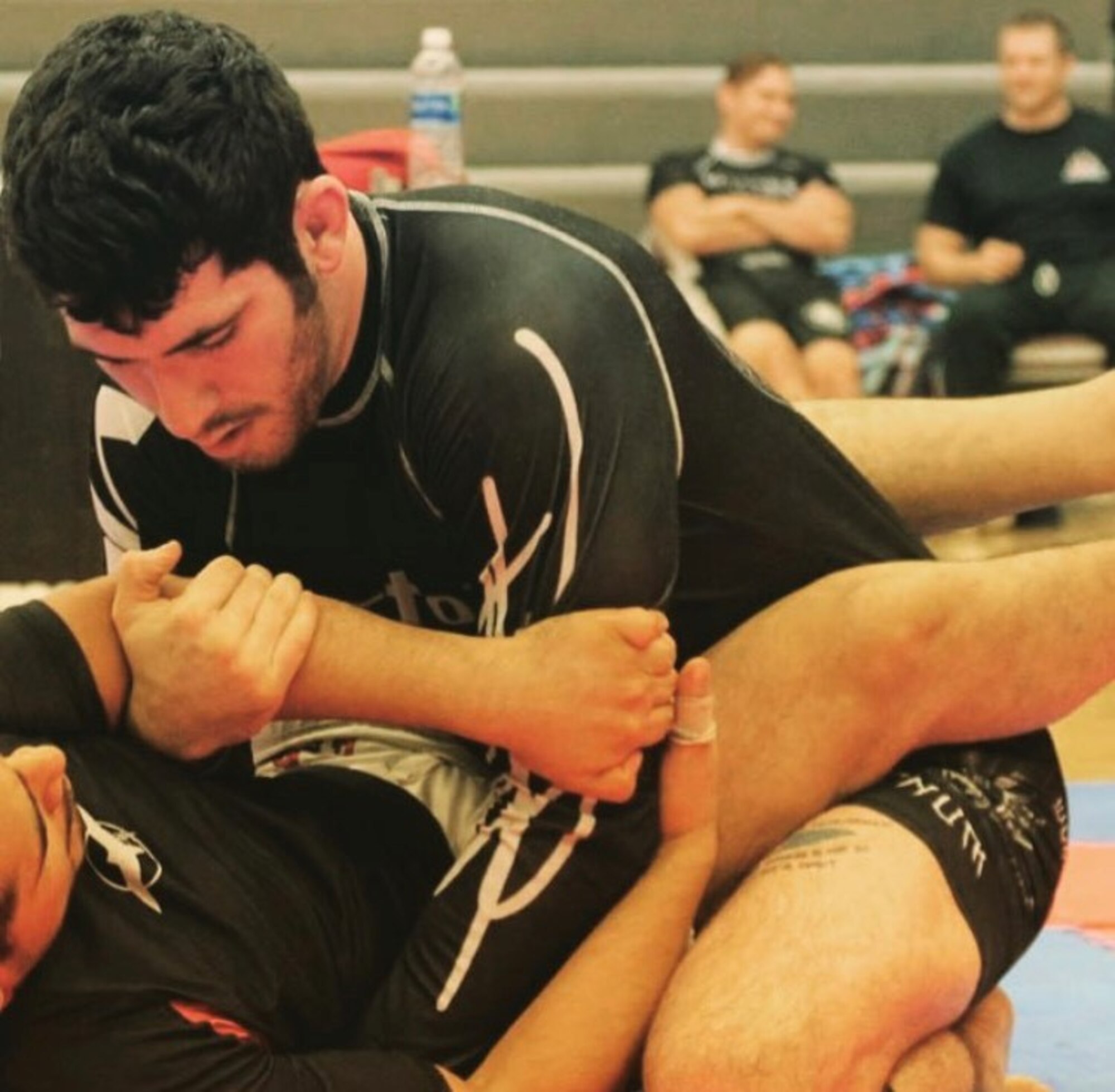 Senior Airman Griffin Broyles, 621st Contingency Response Squadron command support staff specialist, works to pass his opponent’s guard Oct. 15, 2021, at a local gym in Feasterville, Pennsylvania. Broyles recently competed in his first professional grappling match in the 155-pound weight division. (Courtesy photo)