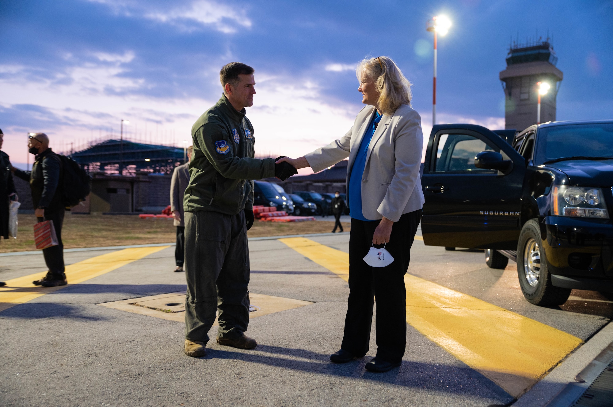 U.S. Air Force Col. Joshua Wood, 51st Fighter Wing commander (left), bids farewell to Mrs. Hollyanne Milley, spouse of Gen. Mark Milley, chairman of the Joint Chiefs of Staff, as she departs Osan