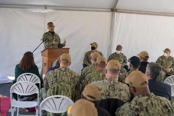 Capt. Milciades "Tony" Then, commodore, Destroyer Squadron (DESRON) 22, speaks during the DESRON 22 change of command ceremony on board the Arleigh Burke-class guided-missile destroyer USS Mitscher (DDG 57). DESRON 22 consists of guided-missile destroyers, including Mitscher, USS Laboon (DDG 58), USS Ramage (DDG 61), and USS Mahan (DDG 72). Established in March 1943, DESRON 22 is one of the oldest destroyer squadrons in the U.S. Navy. (U.S. Navy photo by Mass Communication Specialist 1st Class Jacob Milham/Released)