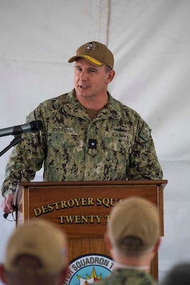 Rear Adm. Scott Robertson, commander, Carrier Strike Group Two, speaks at the Destroyer Squadron (DESRON) 22 change of command ceremony on board the Arleigh Burke-class guided-missile destroyer USS Mitscher (DDG 57). DESRON 22 consists of guided-missile destroyers, including Mitscher, USS Laboon (DDG 58), USS Ramage (DDG 61), and USS Mahan (DDG 72). Established in March 1943, DESRON 22 is one of the oldest destroyer squadrons in the U.S. Navy. (U.S. Navy photo by Mass Communication Specialist 1st Class Jacob Milham/Released)