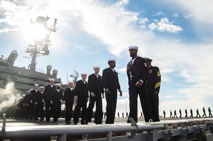 Sailors man the rails on the flight deck of the of the Nimitz-class aircraft carrier USS Harry S. Truman (CVN 75). Truman departed Naval Station Norfolk as part of Harry S. Truman Carrier Strike Group’s (HSTCSG) deployment in support of maritime security operations and theater security cooperation efforts.