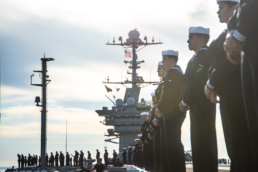 Sailors man the rails on the flight deck of the of the Nimitz-class aircraft carrier USS Harry S. Truman (CVN 75). Truman departed Naval Station Norfolk as part of Harry S. Truman Carrier Strike Group’s (HSTCSG) deployment in support of maritime security operations and theater security cooperation efforts.