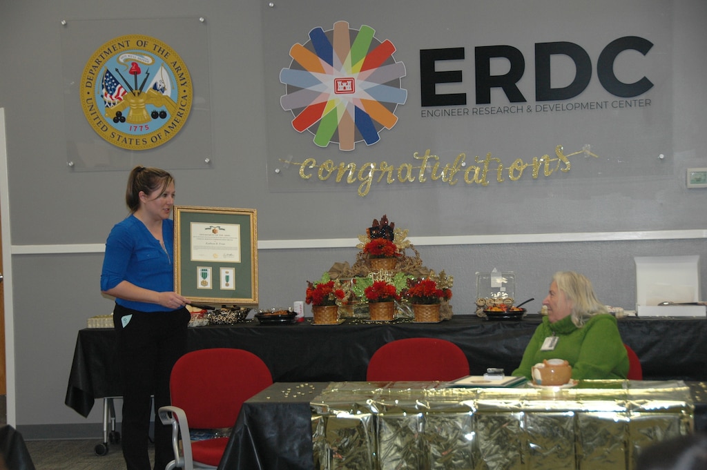 Lesley Miller (left), the U.S. Army Engineer Research and Development Center’s Geotechnical and Structures Laboratory Mobility Systems Branch chief, presents Kathy Friar with the Department of the Army Civilian Service Commendation Medal for her 50 years of service to the organization. (U.S. Army Corps of Engineers photo)
