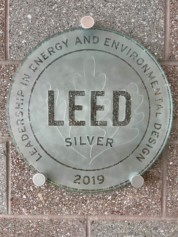 The U.S. Green Building Council’s Leadership in Energy and Environmental Design plaque is displayed in the entryway of the F-35 Flight Simulator Center on Eielson Air Force Base.