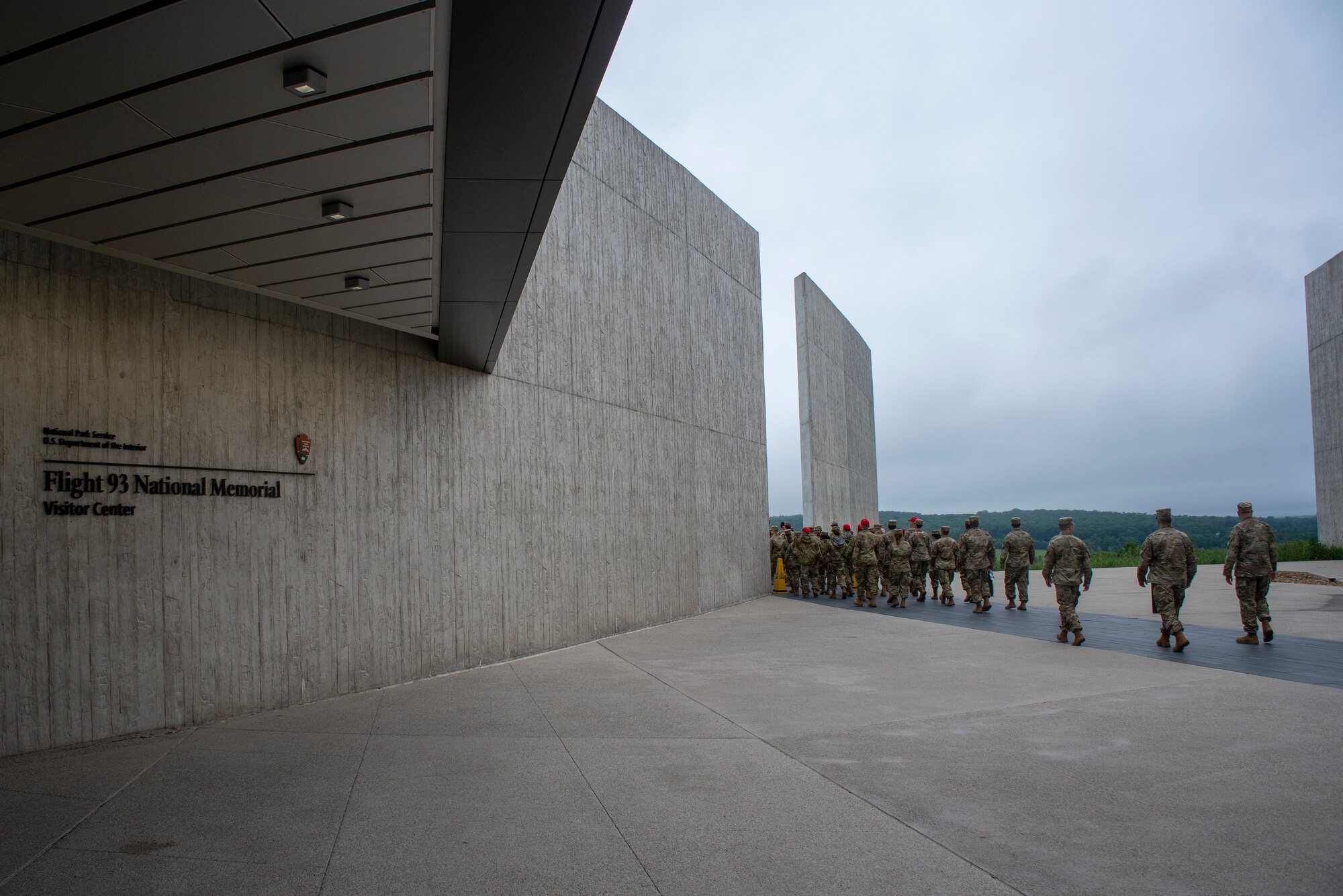 Servicemembers enter the Flight 93 memorial.