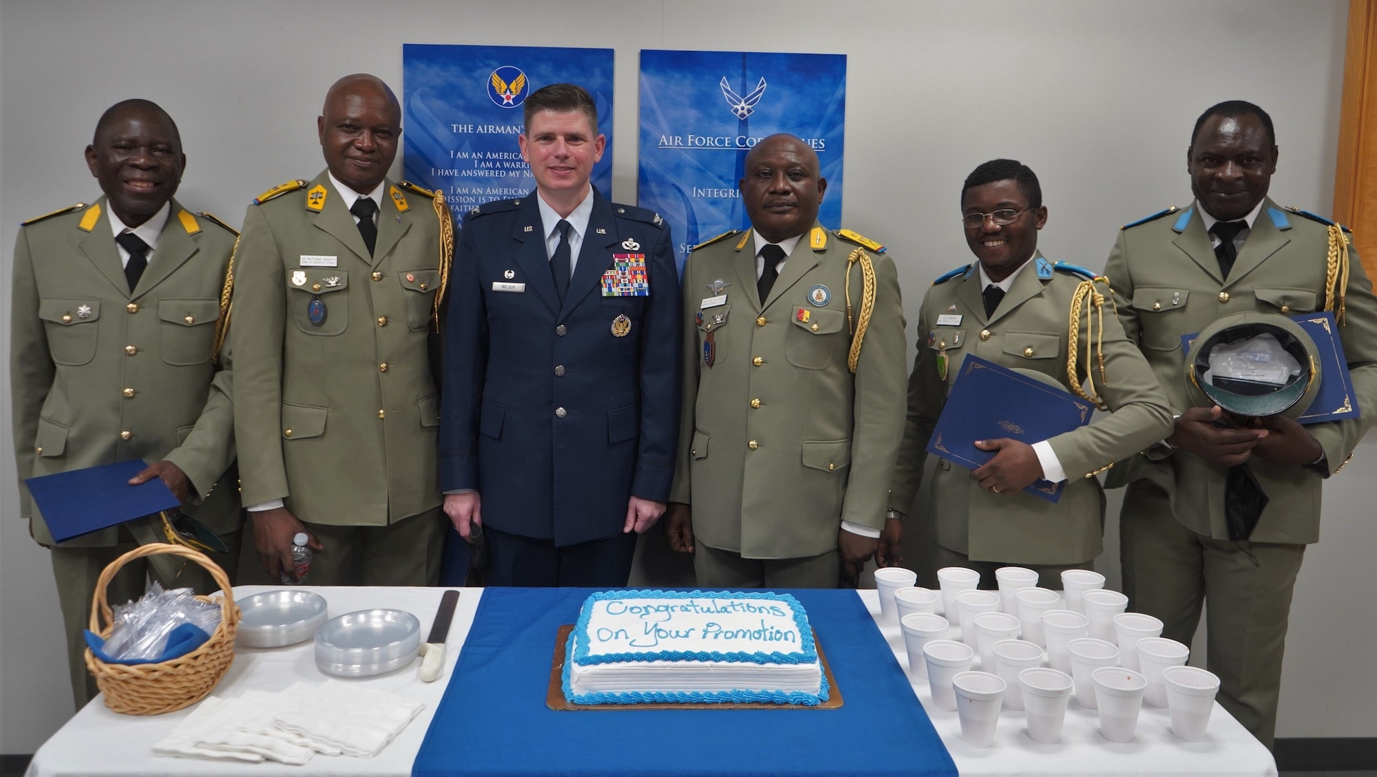 Congolese officers celebrate with Col Wilson, 37 TRW commander