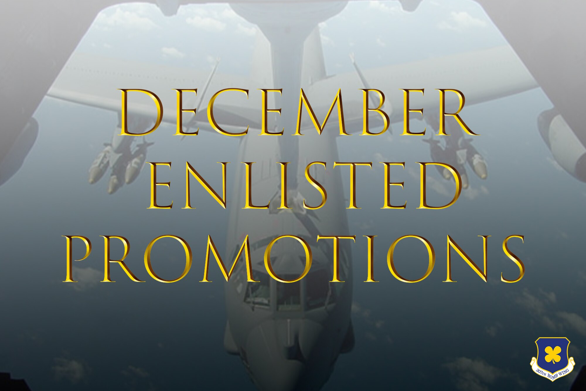 Photo of B-52 with words December Enlisted Promotions in gold
