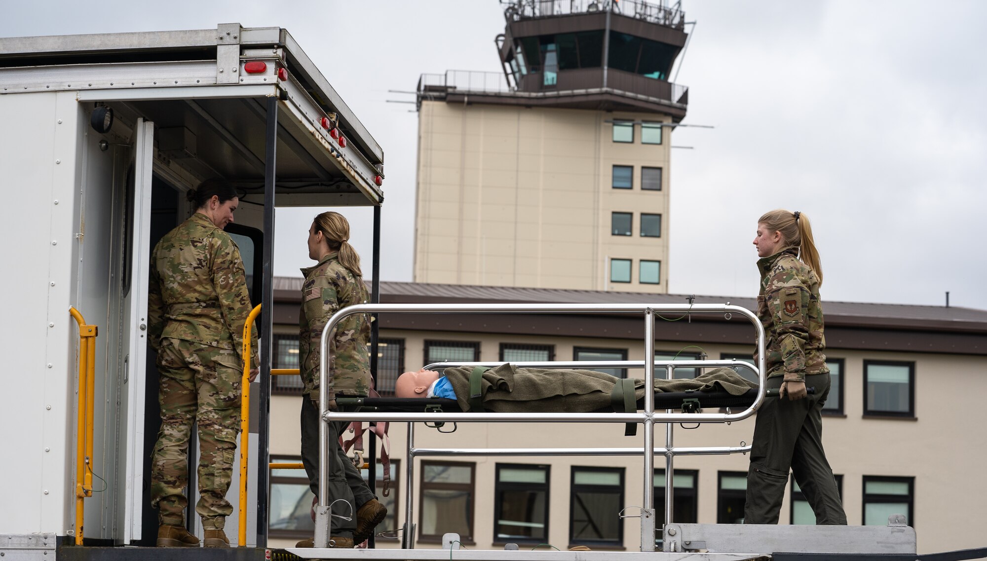 U.S. Air Force Airmen from the 86th Aeromedical Evacuation Squadron, transport simulated patients during an aeromedical evacuation readiness exercise at Ramstein Air Base, Germany, Nov. 18, 2021. The exercise allowed AES Airmen to train as though it was a live mission. (U.S. Air Force photo by Senior Airman Jacob Wongwai)