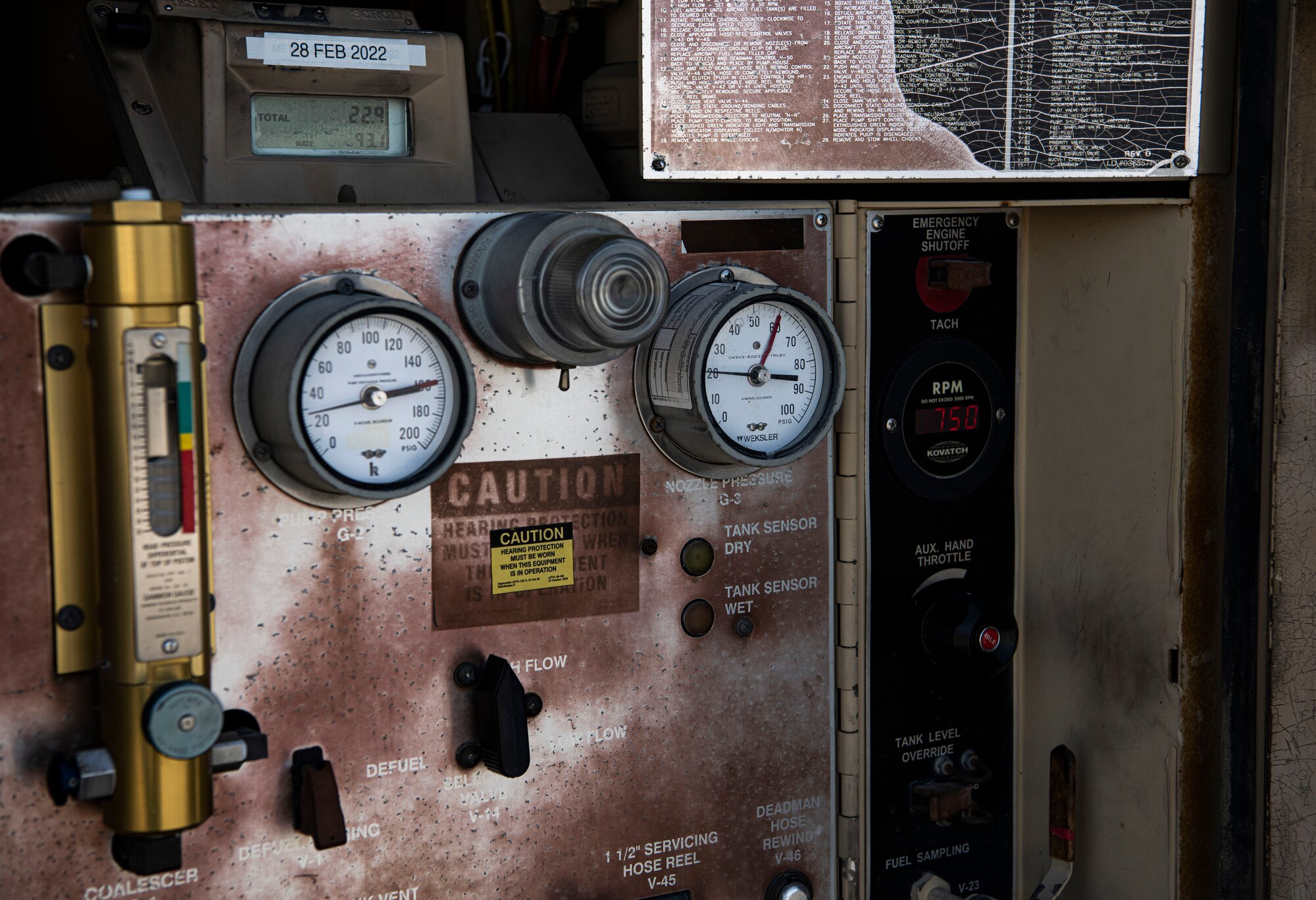 Gauges on a fuel truck display information.