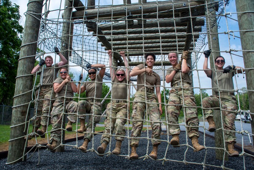 Pennsylvania Air National Guard members celebrate successfully completing a portion of the Leadership Development Course at Fort Indiantown Gap, Pennsylvania, during the Airman Development Program (ADP) June 10, 2021. The 111th Attack Wing Rising Six Council, which is headquartered at Biddle Air National Guard Base in Horsham Pennsylvania, planned and hosted ADP, a three-day course designed to aid in the development of junior-enlisted personnel from from the 111th ATKW, the 171st Air Refueling Wing, and the 193rd Special Operations Wing.