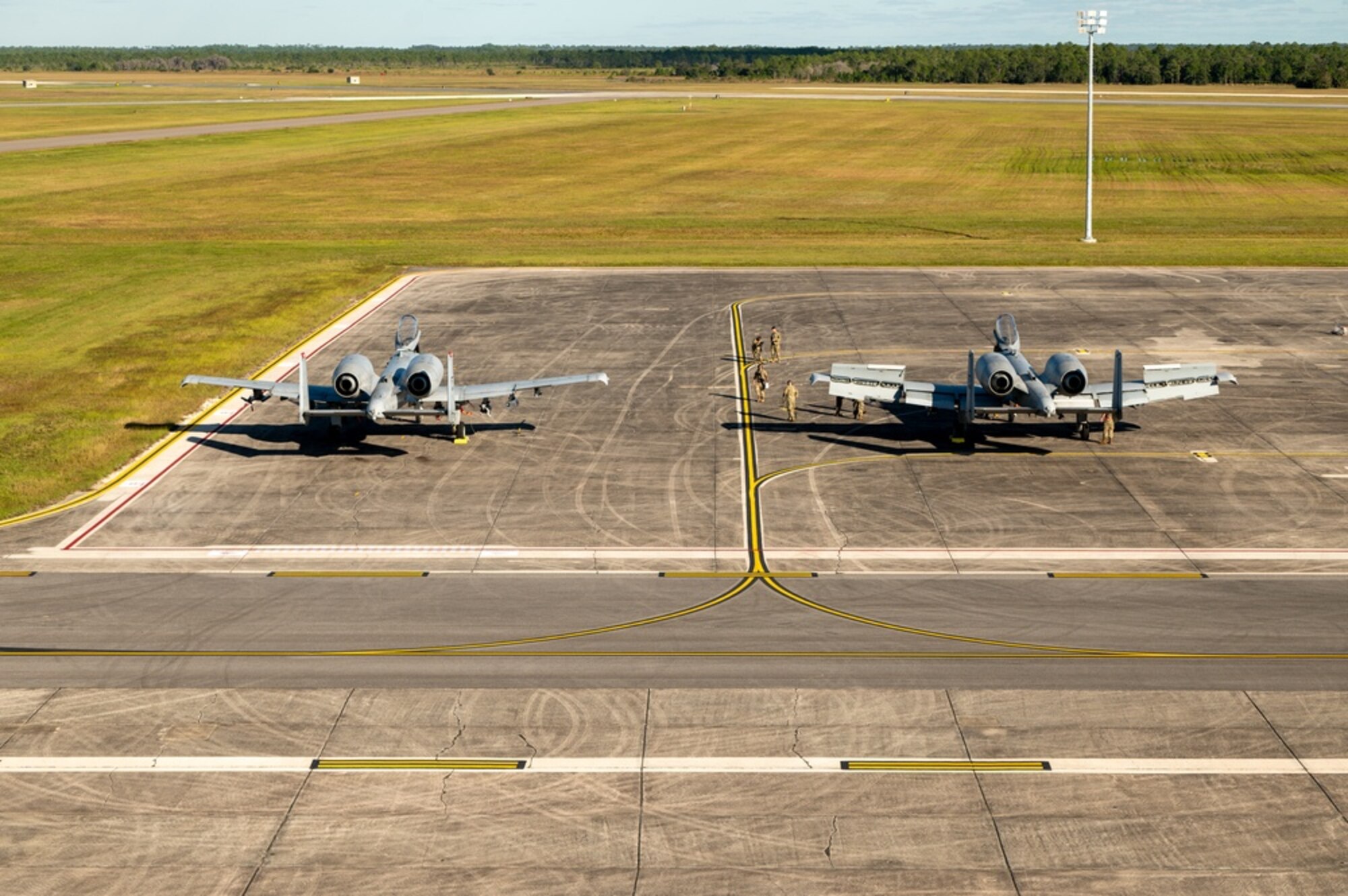 Photo of Airmen conducting post flight inspections