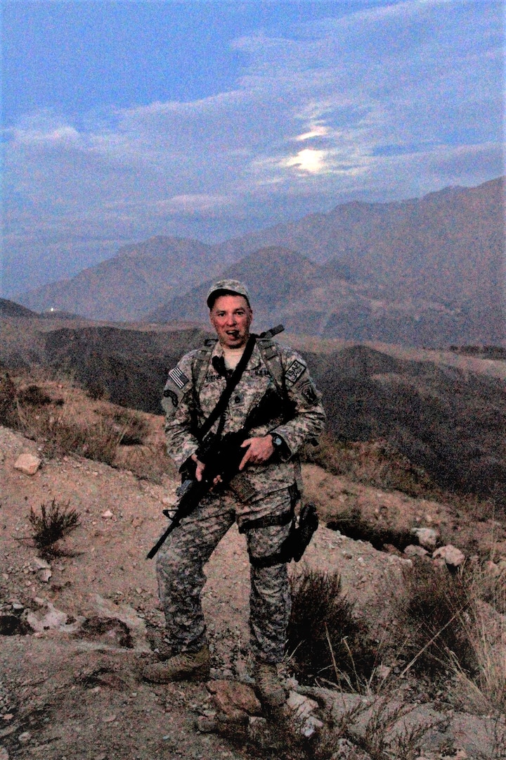 Retired Sgt. 1st Class Richard “Doc” Strous, who served 26 years and deployed three times with the National Guard, poses for a photo in Afghanistan’s Panjshir province during his deployment with the Vermont National Guard’s 86th Infantry Combat Team (Mountain) in 2010.