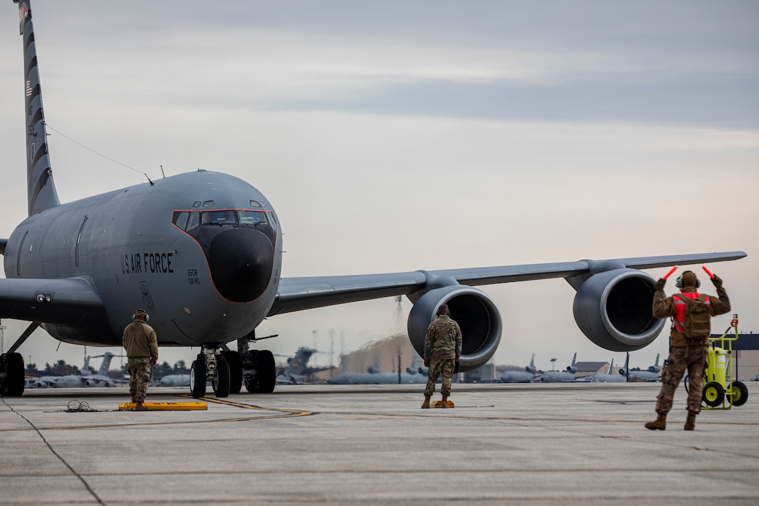 Members from the 108th Operations Group, 108th Maintenance Group and 108th Logistics Readiness Squadron perform their first hot refueling of a KC-135R Stratotanker on Nov. 30, 2021.