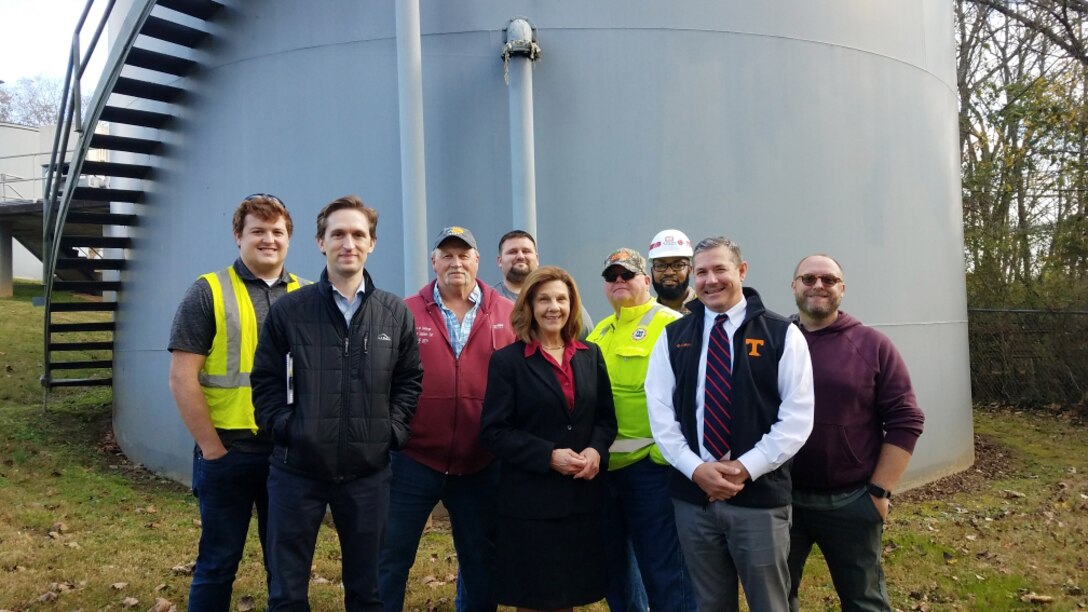 U.S. Army Corps of Engineers, wastewater treatment plant staff and the mayor of Carthage, Tennessee, pose at the Carthage Wastewater Treatment Plant Nov. 17, 2021 during a kick-off event for a streambank stabilization project to address erosion threatening the plant by the Cumberland River.