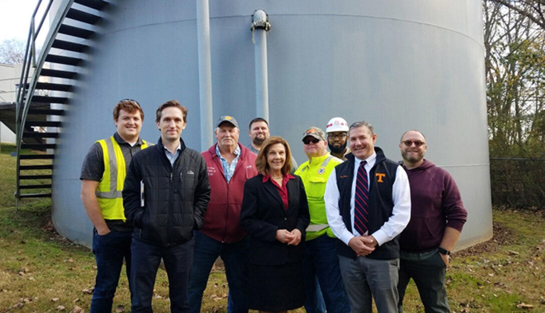 U.S. Army Corps of Engineers, wastewater treatment plant staff and the mayor of Carthage, Tennessee, pose at the Carthage Wastewater Treatment Plant Nov. 17, 2021 during a kick-off event for a streambank stabilization project to address erosion threatening the plant by the Cumberland River.