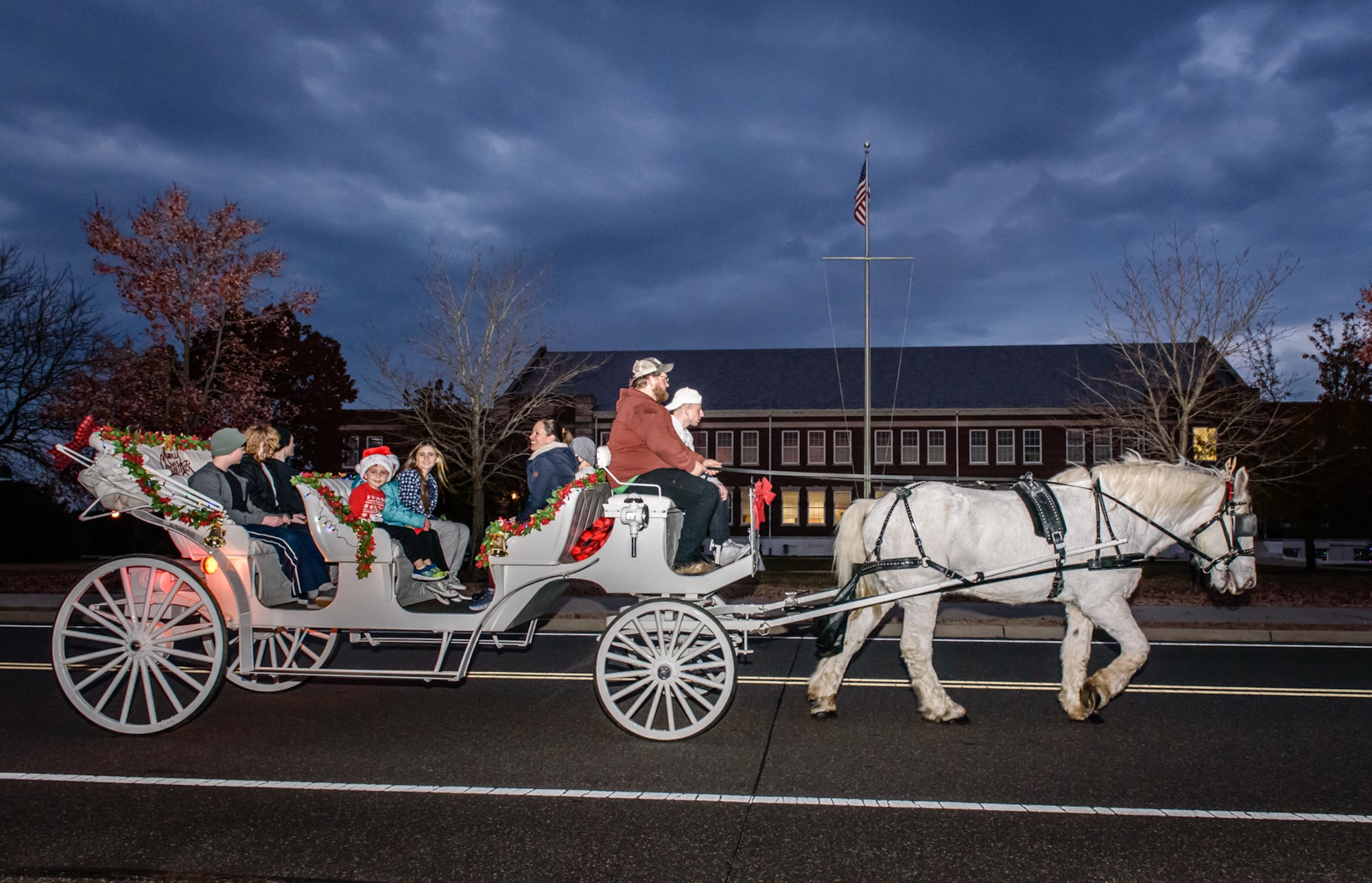 The annual tradition attended by leadership and JB MDL families offered horse & carriage rides, hot chocolate, cookies, funnel cake, pretzels, kettle corn and a special visit from the North Pole! (U.S. Navy photo by Russ Meseroll)