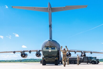 U.S. Airmen with the 105th Airlift Wing, New York National Guard, load an M142 High Mobility Artillery Rocket System, belonging to the 2nd Battalion, 130th Field Artillery Regiment, Kansas Army National Guard, into a C-17 Globemaster III aircraft, at Rosecrans Air National Guard Base, in St. Joseph, Missouri, June 4, 2021.