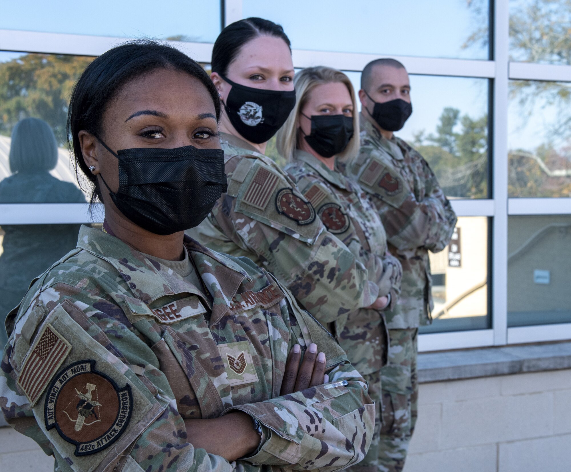 Photo of Airmen standing.