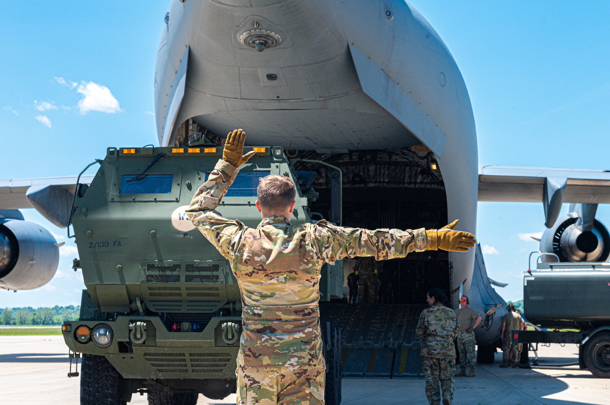 U.S. Airmen with the 105th Airlift Wing, New York National Guard, load an M142 High Mobility Artillery Rocket System, belonging to the 2nd Battalion, 130th Field Artillery Regiment, Kansas Army National Guard, into a C-17 Globemaster III aircraft, at Rosecrans Air National Guard Base, in St. Joseph, Missouri, June 4, 2021.