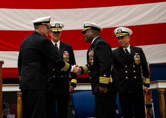 Capt. Joseph O'Brien, left, relieves Capt. Justin Fauntleroy as commanding officer, Cruise Missile Support Activity Atlantic (CMSALANT) during a change of command ceremony on board Naval Station Norfolk, Dec. 2, 2021.