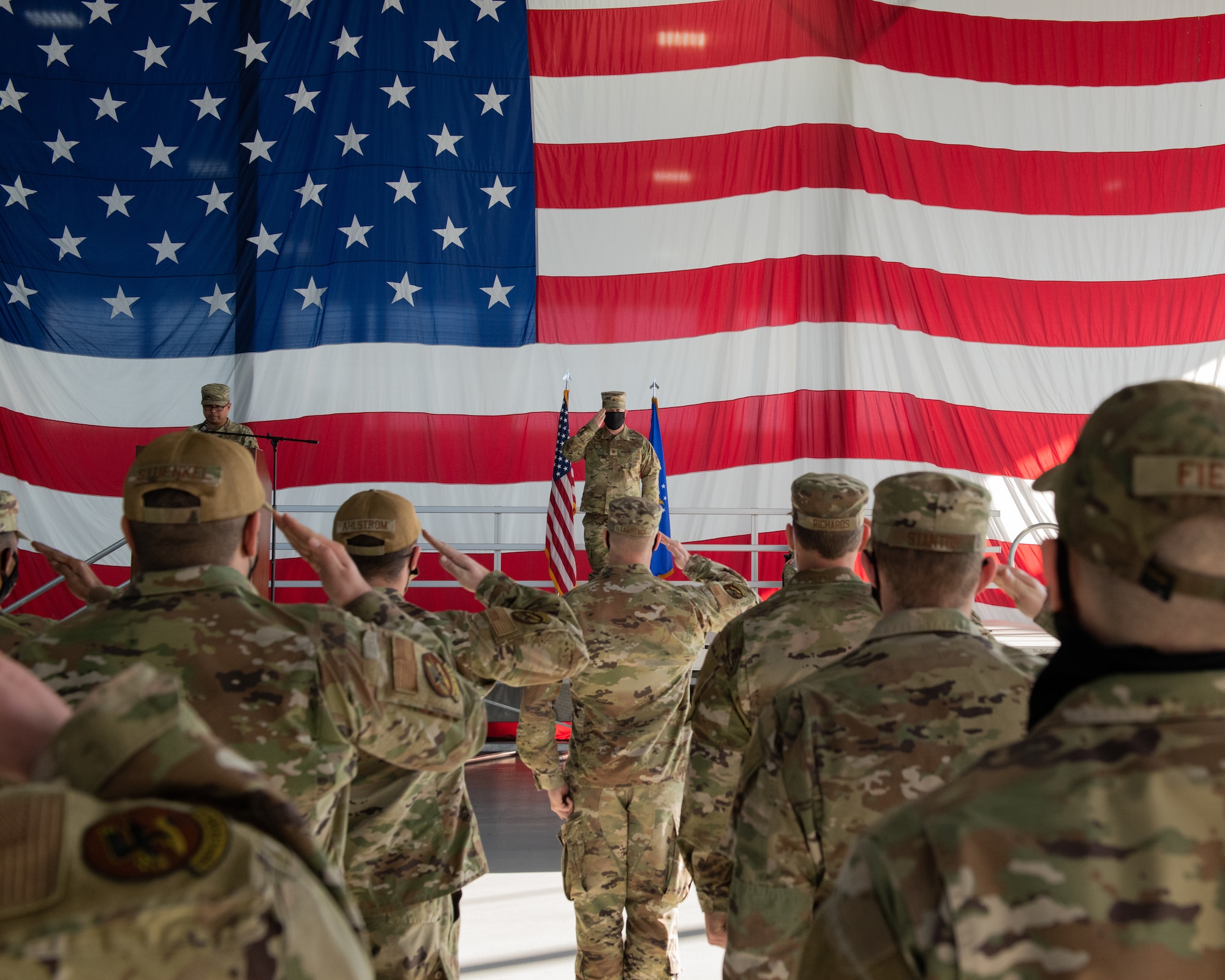 Airmen from the 389th Fighter Generation Squadron give the first salute to their new commander, Maj. Reis Griffin