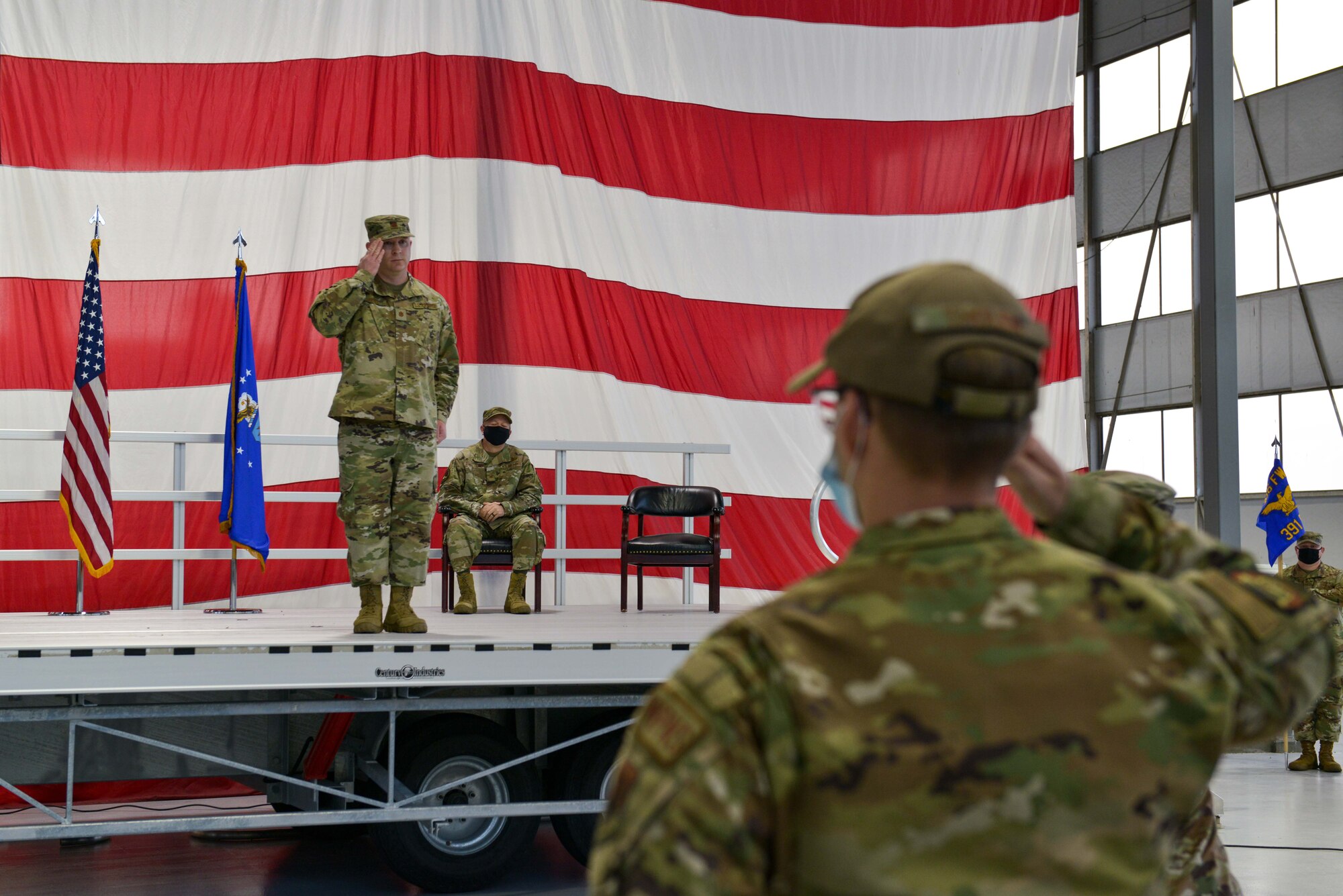 U.S. Air Force Airmen render the first salute to Maj. Jeremy Geidel, 391st Fighter Generation Squadron commander, on Mountain Home Air Force Base, Idaho, Dec. 3, 2021. The activation of the 389th FGS brings the 366th Fighter Wing in line with Air Combat Command’s Combat Oriented Maintenance Organization model.