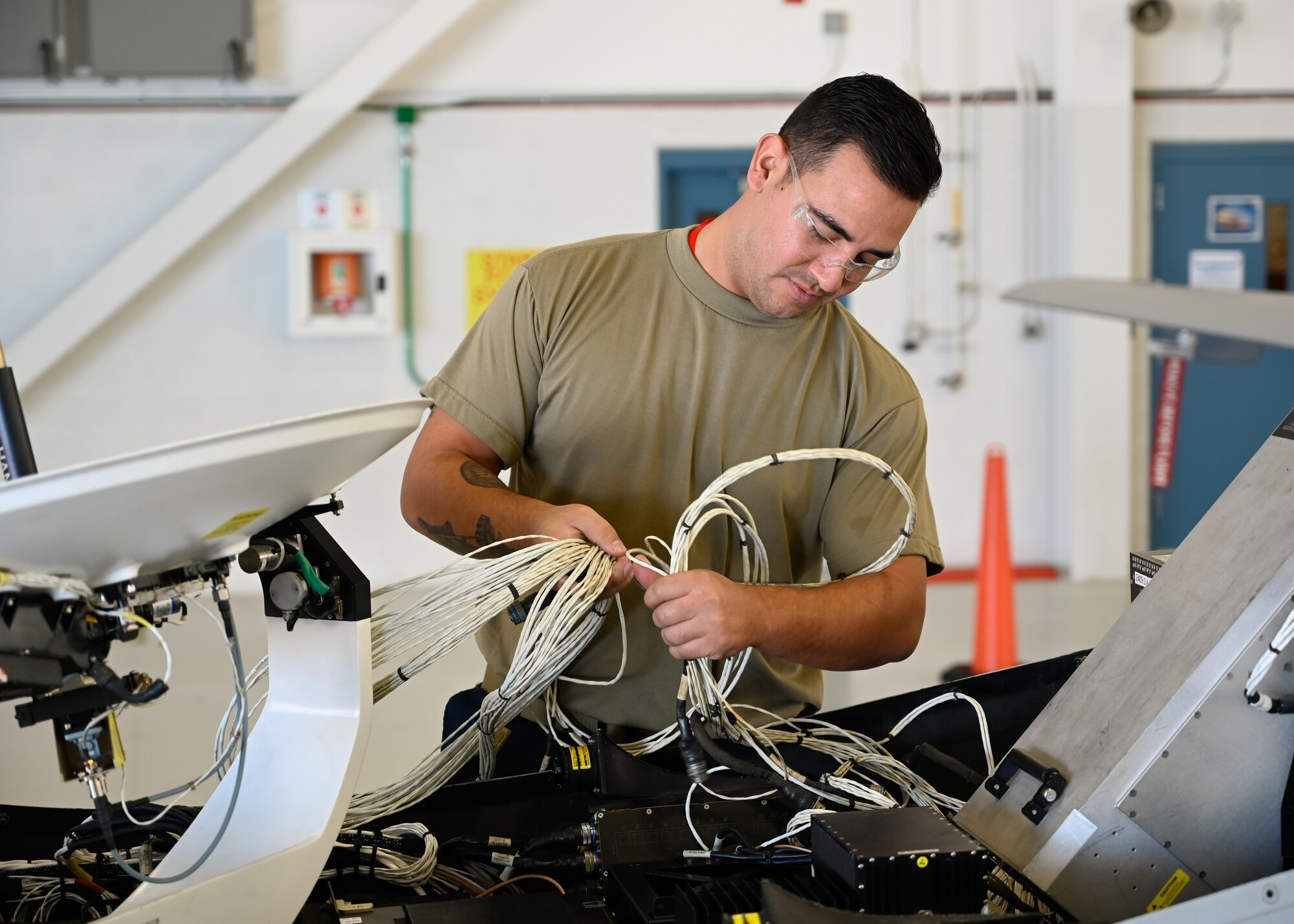 Staff Sgt. Paul Robledo Garcia, a 214 LRE Avionics Technician here, is one of the first Air National Guard and Air Force maintainers to completely dis- and reassemble the MQ-9 Reaper.