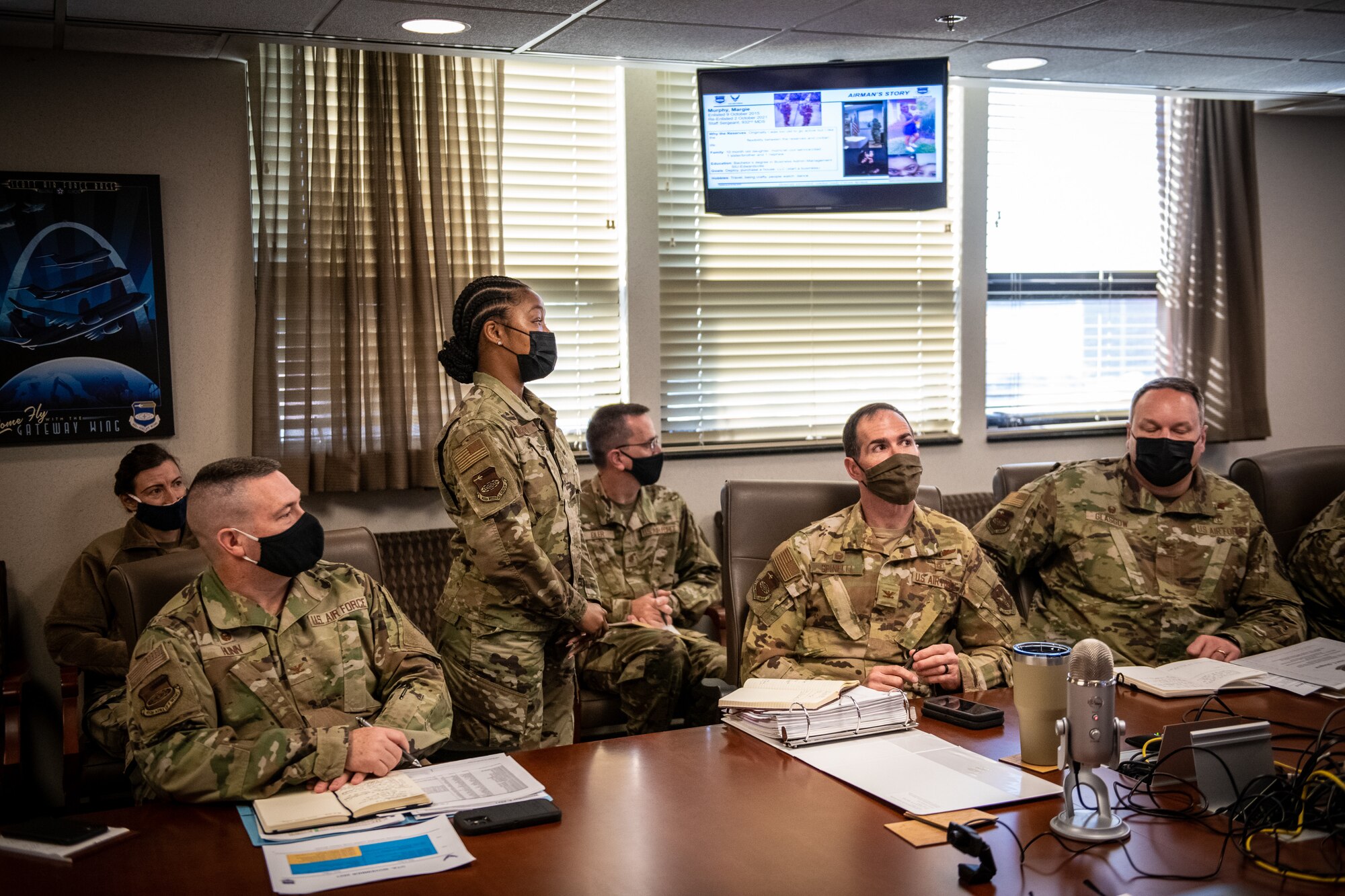 Staff Sgt. Margie Murphy, a 932nd Medical Squadron health services management technician, presents her Airman's Story during the wing review briefing, February 5, 2021, Scott Air Force Base, Illinois. (U.S. Air Force photo by Christopher Parr)