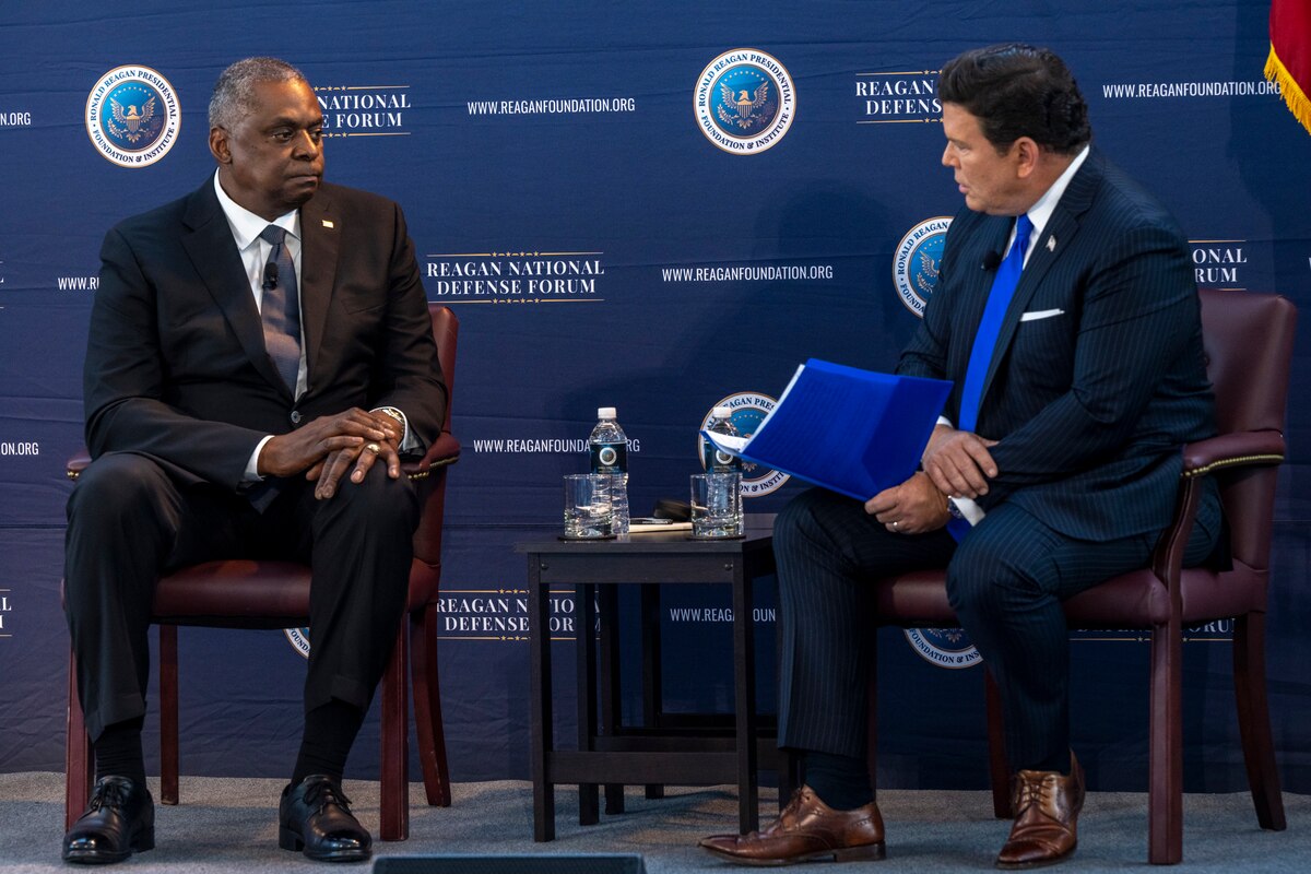 Two men sit during an interview.
