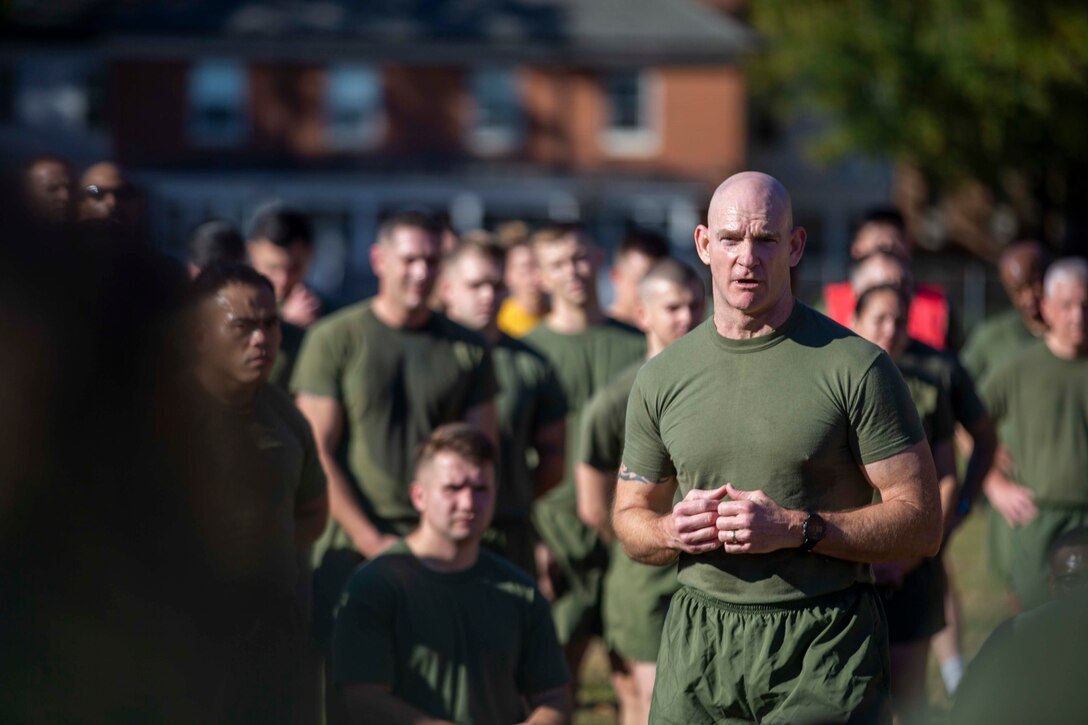 U.S. Marine Sgt. Maj. Troy E. Black, the 19th Sergeant Major of the Marine Corps, speaks to Marines with Headquarters Marine Corps and Headquarters Service Support Battalion following a formation run to the Marine Corps War Memorial in Arlington, Virginia, Nov. 9, 2021. The run was conducted in honor of the 246th Marine Corps birthday. A formation run is a traditional way units across the Marine Corps can celebrate the Marine Corps in addition to the cake cutting ceremony. (U.S. Marine Corps photo by Sgt. Victoria Ross)