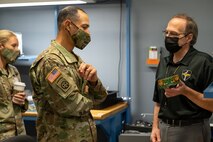 Photo of Mark Sgobba briefing Maj. Gen. Edmonson.